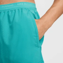 Nike Men's DRI-FIT Stride 7" 2-in-1 Shorts (345 - Dusty Cactus/Reflective Silver) -TCRunning Shop AURORA DM4759 345 PHSYM003 2000