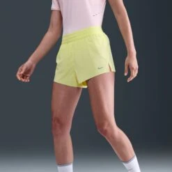 Nike Women's Swift Dri-FIT Mid-Rise 2.5" Brief-Lined Running Shorts (712 - Light Zitron/Reflective Silver) -TCRunning Shop AURORA HQ0638 712 PHSYMG01 2000