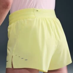 Nike Women's Swift Dri-FIT Mid-Rise 2.5" Brief-Lined Running Shorts (712 - Light Zitron/Reflective Silver) -TCRunning Shop AURORA HQ0638 712 PHSYMG02 2000