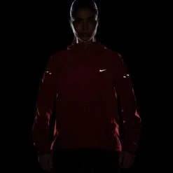Nike Women's Swift Repel Packable Running Jacket (696 - LT Crimson/Reflective Silver) 15 Nike Women's Swift Repel Packable Running Jacket (696 - LT Crimson/Reflective Silver) -TCRunning Shop AURORA HQ0650 696 PHSYM200 2000