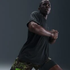 Nike Men's Dri-FIT 7" Brief-Lined Printed Running Shorts (012 - Black/White/Forest Green/Reflective Silver) -TCRunning Shop AURORA IH4512 012 PHSYMG03 2000