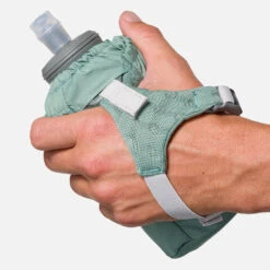 Nathan Pinnacle Soft Flask Handheld 18oz - Sage Green/Reflective Silver -TCRunning Shop NS70700 50213 Pinnacle 18ozSoftFlask onBody 2 1000x c5028720 5323 4d43 adbd edf19d21c522